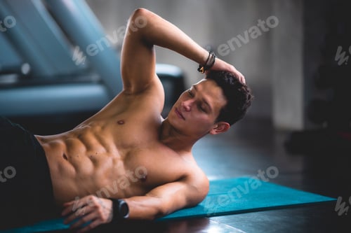 Preview: close up of muscle strength of male handsome sportman at the cadio fitness excercise and workout