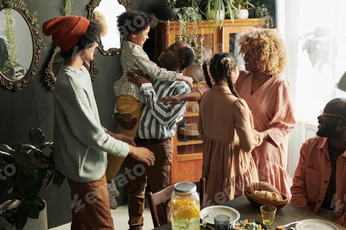 Preview: Happy family gathering together at home