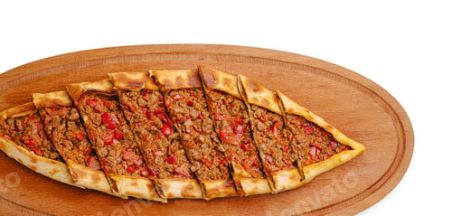 Preview: Turkish pide with minced meat and veggies on a wooden board
