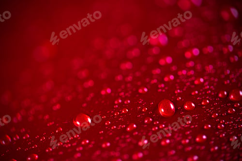 Preview: Red aluminum can with water drops or dew close-up macro shot