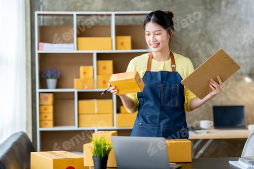 Preview: Portrait of Starting small businesses SME owners, two Asian woman check online orders Selling produc
