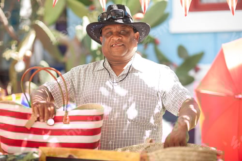 Preview: Happy market trader with tote bag