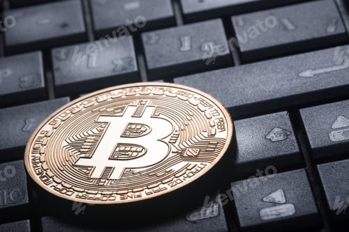 Preview: Crypto currency gold bitcoin on the computer keyboard