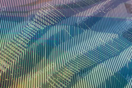 Preview: Abstract building wall design. Multicolored metal lines in the design of the design.