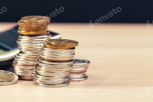 Preview: stack of coins and calculator,concept idea for business finance