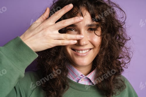 Preview: Close up of an excited happy young woman in casual wear
