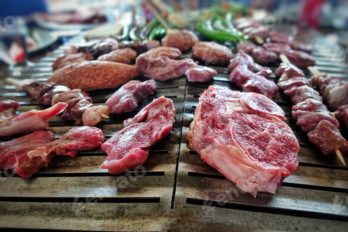 Preview: Mixture of Raw Meat on Barbecue