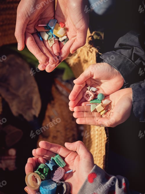 Preview: Crop people collecting plastic waste