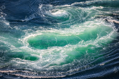 Preview: Blue waves of water of the river and the sea meet each other during high tide and low tide.