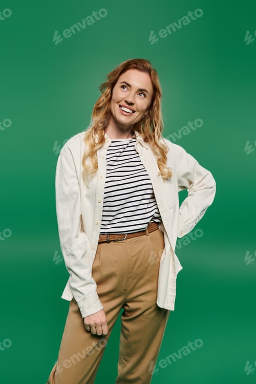 Preview: A joyful moment for a woman with curly hair on a vibrant green chroma key background