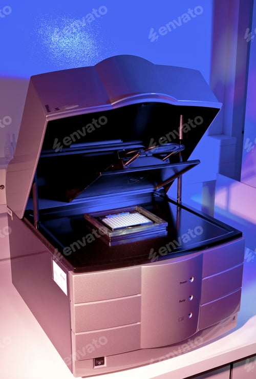 Preview: A modern printer under purple-hued lighting
