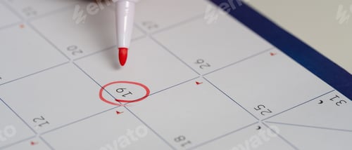 Preview: Red pen marking an important date, symbolizing appointment, deadline, or reminder planning.