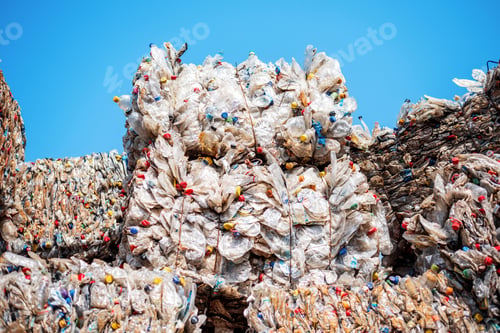 Preview: Cubes of compressed plastic garbage at a waste recycling factory