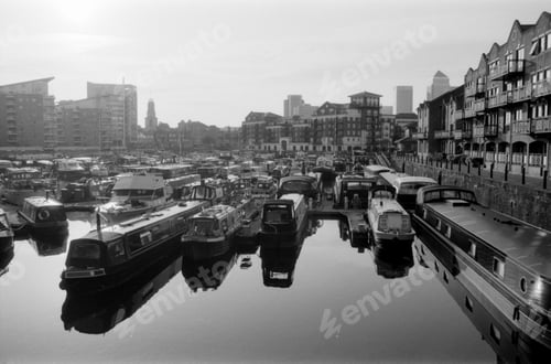 Preview: Analog vintage photo of narrowboats moored in london's limehouse basin marina