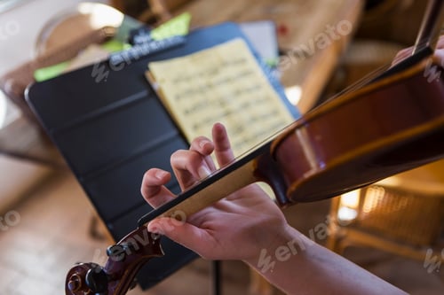 Preview: close up of hands playing violin
