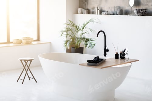 Preview: Spacious, modern bathroom interior featuring sleek freestanding bathtub