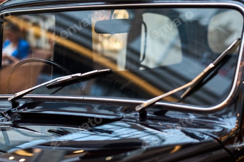 Preview: Retro car windscreen with a windshields closeup. Part of black vintage car