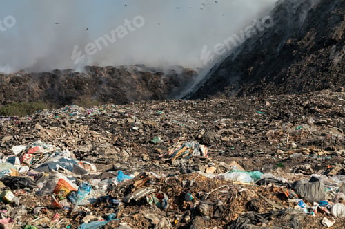 Preview: Landfill with burning trash piles