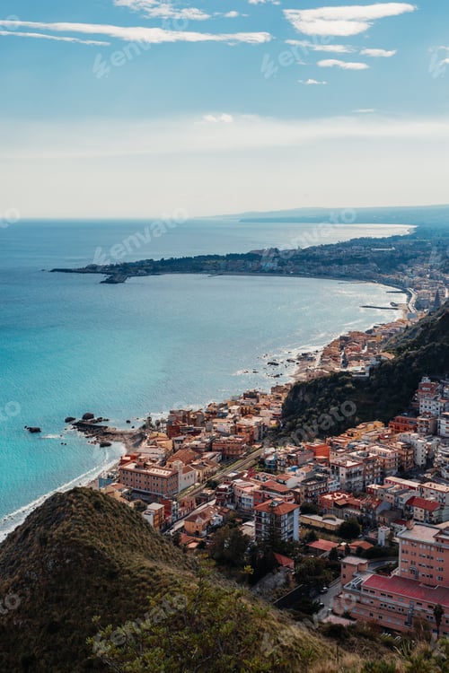 Preview: Aerial view of a picturesque Italian coastal town, with colorful buildings