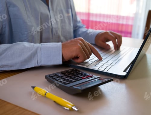 Preview: Man hands typing on computer keyboard closeup,