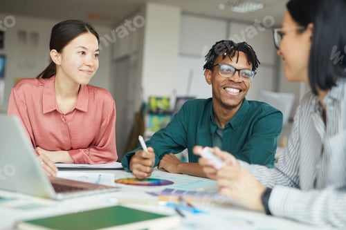 Preview: Multiethnic business people working at office