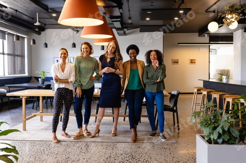 Preview: Portrait of happy diverse female colleagues in casual meeting in office