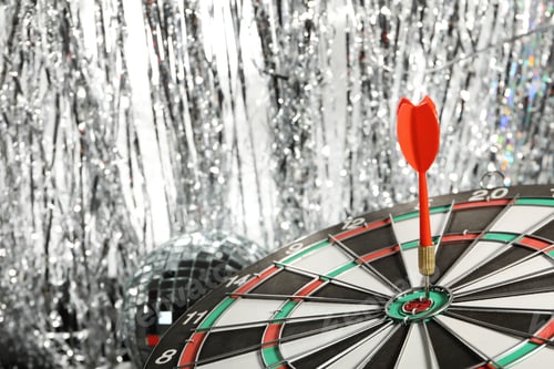 Preview: Darts hitting the target game at the party.