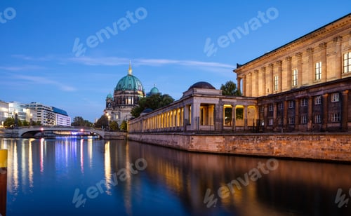Preview: Bode museum illuminated, Spree river, museum island, Berlin, in the evening.