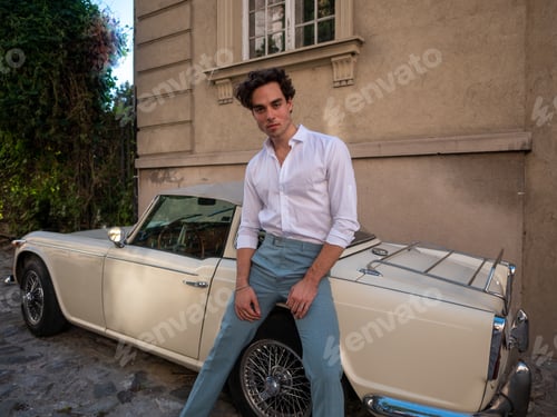 Preview: Handsome, Sexy, Young Man Posing Near Retro Car. Vintage Car