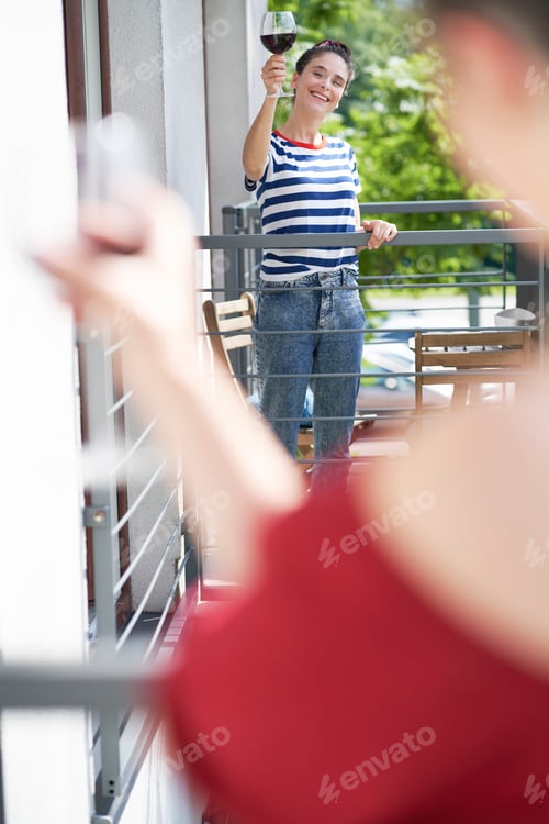 Preview: Women drinking wine during social distancing