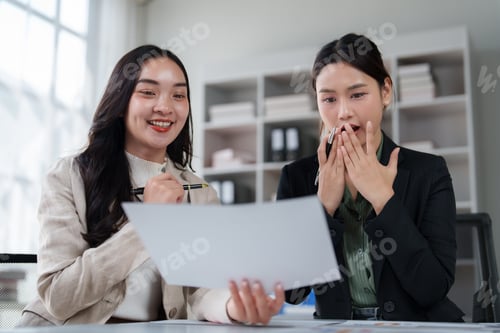 Preview: Businesswomen reacting surprised to company results