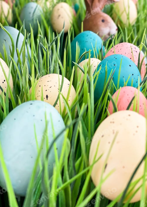 Preview: Colorful Easer eggs and bunny rabbit in tall green grass