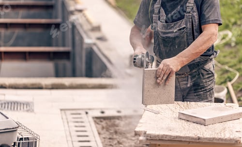 Preview: Worker hand using circular saw