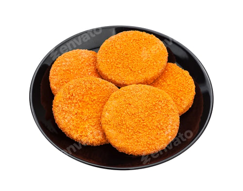 Preview: Breaded Patties on a Black Plate Isolated