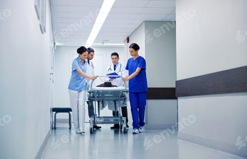 Preview: medics and patient on hospital gurney at emergency
