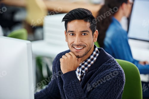 Preview: Coming up with a fool-proof plan. Cropped shot of a handsome young designer working on a pc.