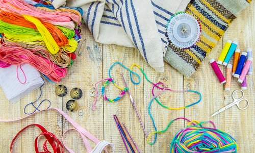 Preview: Threads and accessories for sewing and knitting. Selective focus.