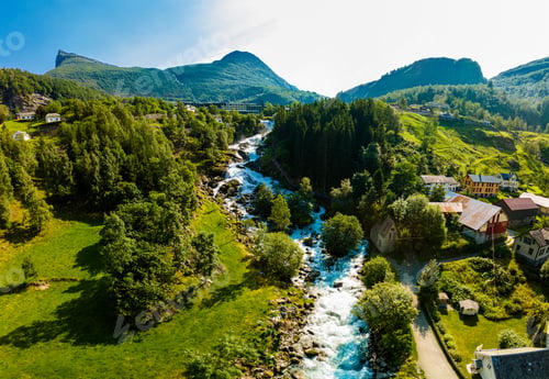 Preview: View of the river Geirangerelvi and the waterfall Storfossen in Geiranger, Norway.