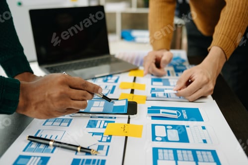 Preview: UX developer and ui designer brainstorming about mobile app interface wireframe design