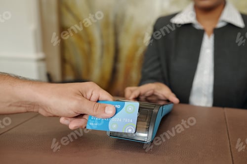 Preview: Man Completing Payment Using Card Reader Device