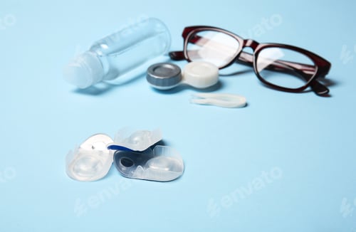 Preview: Contact lenses, glasses and accessories on color background