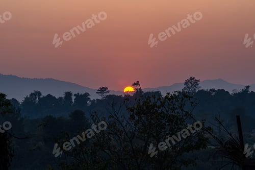 Preview: gloomy Sunset view over the river in Sauraha, Chitwan, Nepal