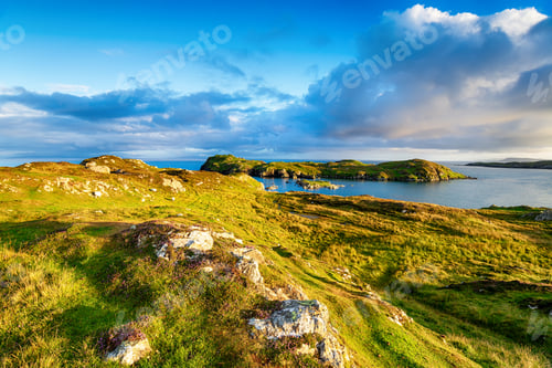 Preview: Evening light over the grassy coastline at Rodel