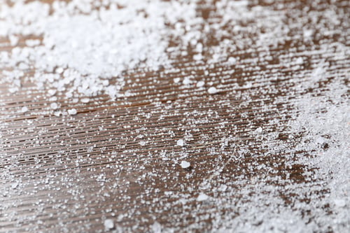 Preview: Organic white salt on wooden table, closeup