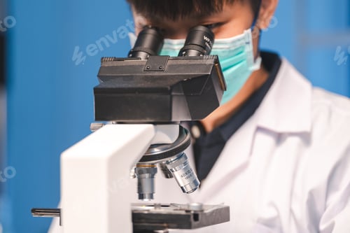 Preview: researcher working in laboratory for medicals science research using scientific equipment technology