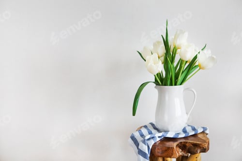 Preview: Tulips bouquet in white vase on wooden rustic chair