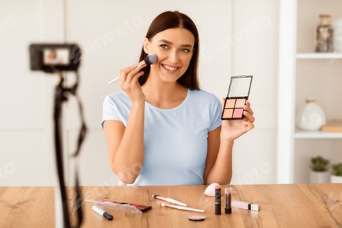 Preview: Girl Creating Beauty Blog Making Video Sitting At Camera Indoors