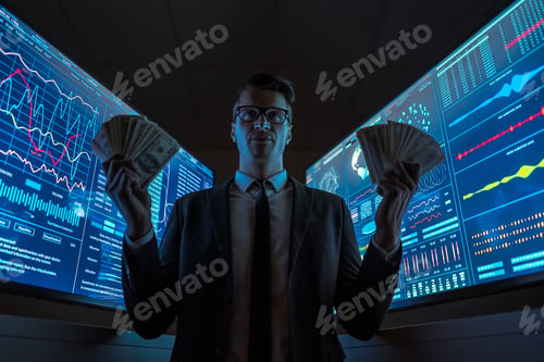 Preview: The smiling businessman holding dollars in his hands
