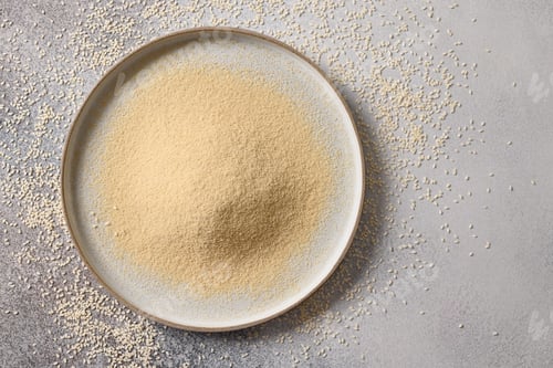 Preview: Sesame flour in plate for cooking vegan gluten-free dessert.