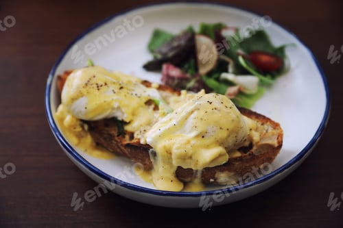 Preview: Egg Benedict , Poached Eggs With Toast On Wood Background , English Breakfast